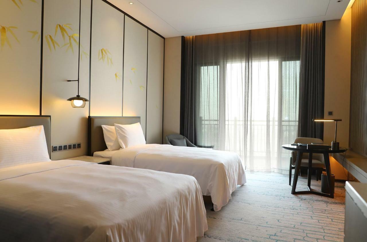 Wanda Realm Wuxi Hotel Exterior foto